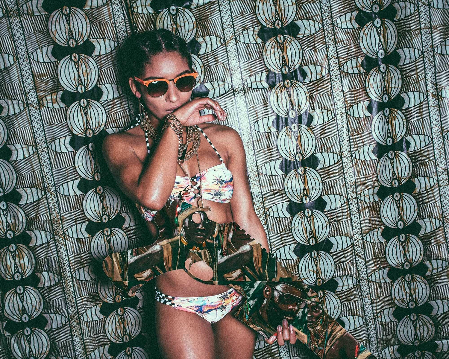 A woman wearing a bikini and sunglasses poses with a skateboard, exuding a relaxed summer vibe.
